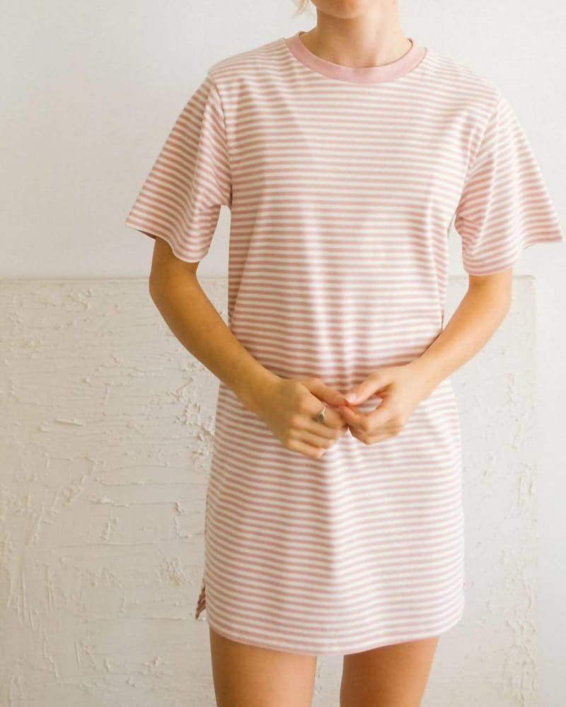 Front of a model wearing a size L T-Shirt Dress in Pink Multi in Pink Multi by Things Between. | dia_product_style_image_id:339865